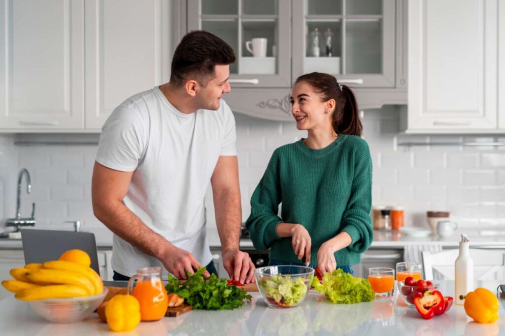 A happy male and female couple enjoying a bowl of vegan miso soup.