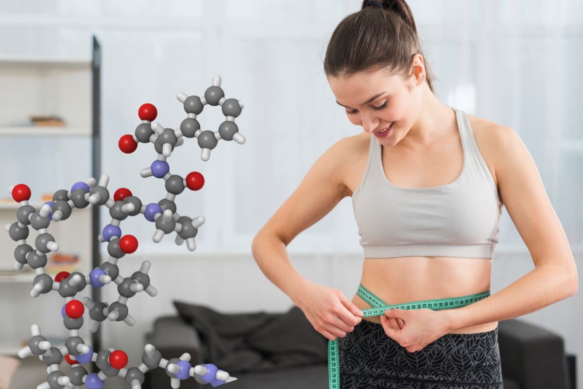 Smiling woman measuring her waist with a tape measure, showcasing the effectiveness of peptides for weight loss.