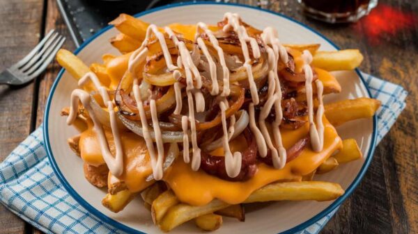 Animal Style Fries Animal Style Fries Topped With Melted Cheese, Grilled Onions, And Thousand Island Dressing.