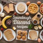 Sourdough Discard Recipes A Variety Of Baked Goods Arranged On A Wooden Surface, Featuring Items Like Pancakes, Waffles, Muffins, Bread, Crackers, And Cakes, Along With Ingredients Like Bananas, Eggs, Chocolate, And Herbs. The Text &Quot;Sourdough Discard Recipes&Quot; Is Prominently Displayed In The Center Of The Image.