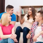 Teen Using Phone, Communicating With Slang, While Parents Observe With Curiosity And A Desire To Connect.