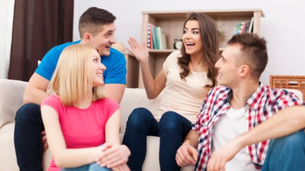 Teen Using Phone, Communicating With Slang, While Parents Observe With Curiosity And A Desire To Connect.