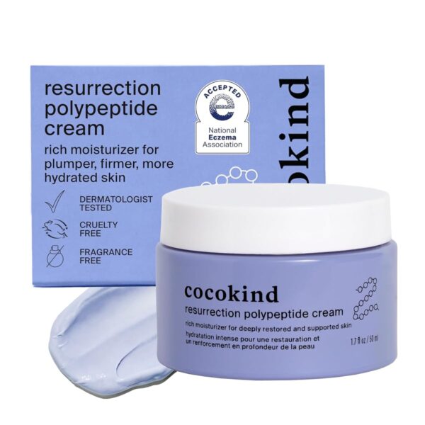 A Jar Of Cocokind Resurrection Polypeptide Cream Placed In Front Of Its Blue Box Packaging. The Packaging Highlights Key Features Such As &Quot;Dermatologist Tested,&Quot; &Quot;Cruelty-Free,&Quot; &Quot;Fragrance-Free,&Quot; And Acceptance By The National Eczema Association.